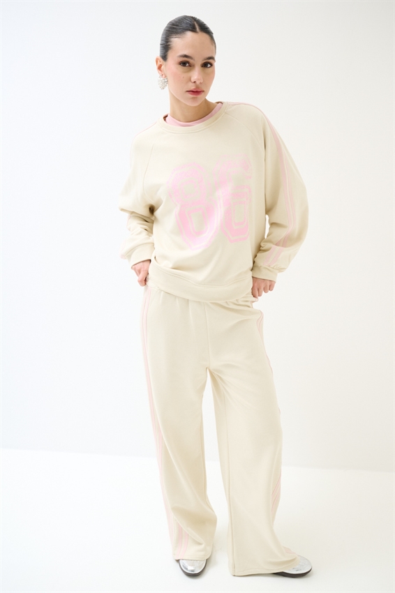 PANTALONE AMPIO CON 4 BANDE BURRO/ROSA