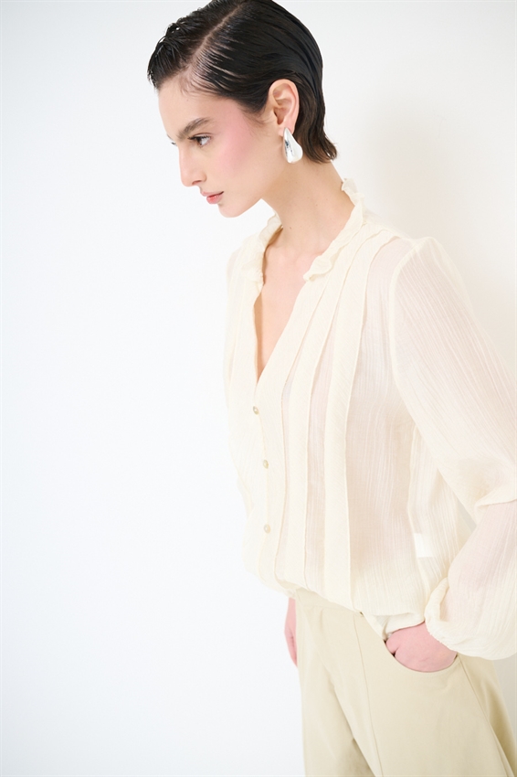 BLUSA CON ROUCHES E BOTTONI