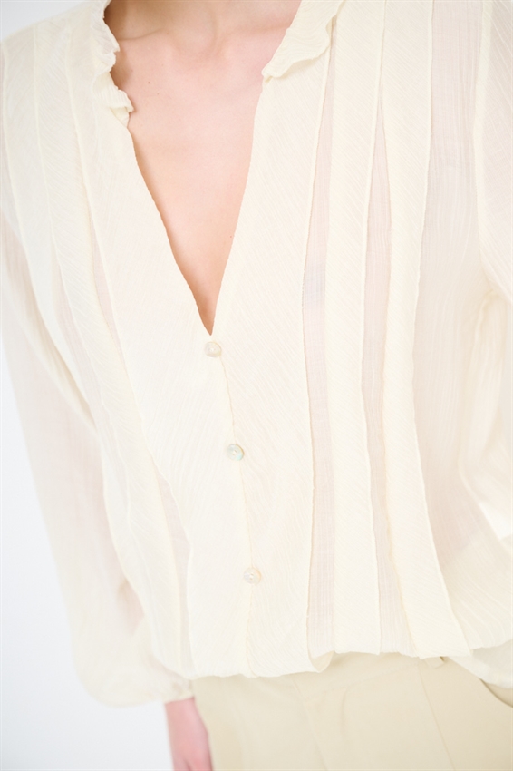 BLUSA CON ROUCHES E BOTTONI