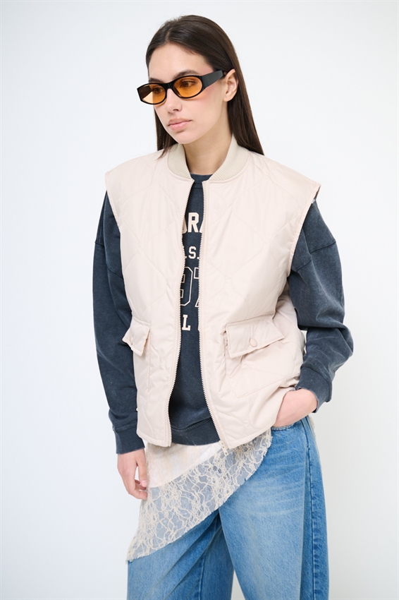 GILET TRAPUNTATO CON TASCHINI