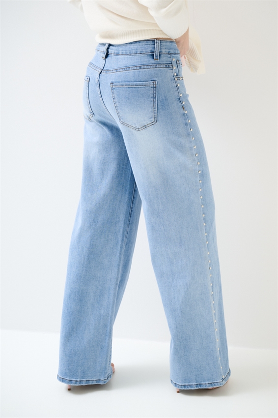 JEANS A PALAZZO CON BORCHIE