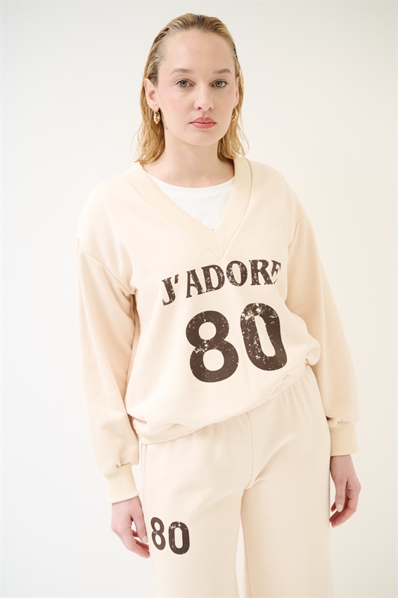 FELPA OVER CON SCOLLO V E STAMPA