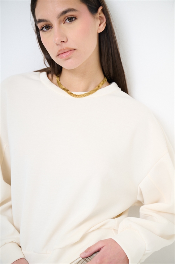 MAGLIA CORTA CON CUCITURA SULLA MANICA