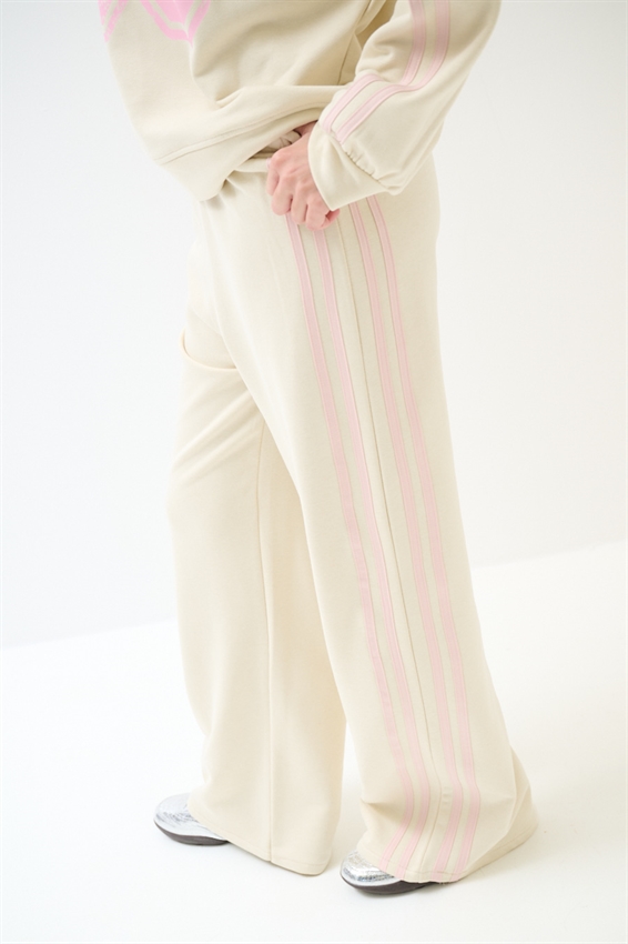 PANTALONE AMPIO CON 4 BANDE