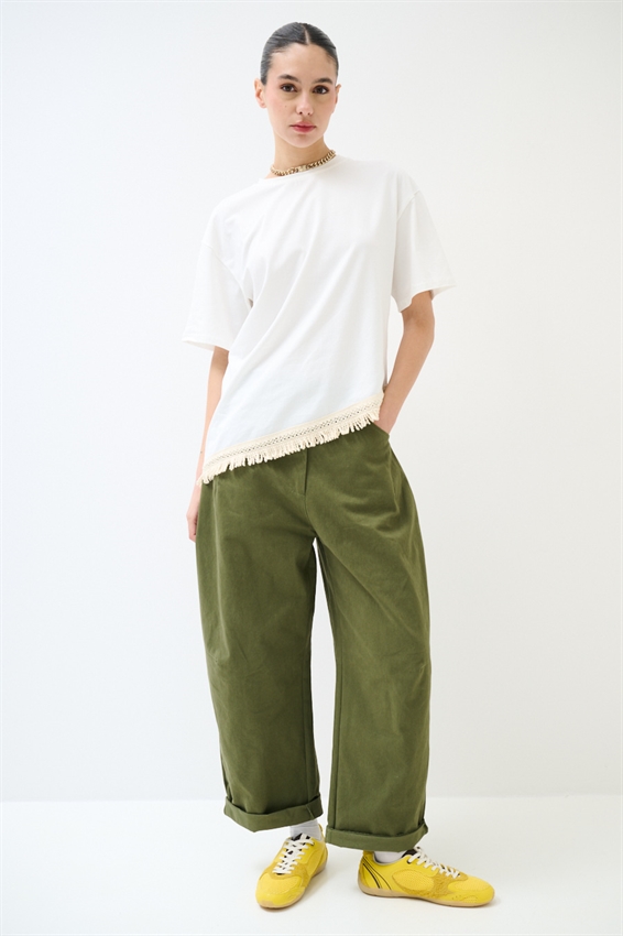 T-SHIRT ASIMMETRICA CON FRANGE SUL FONDO