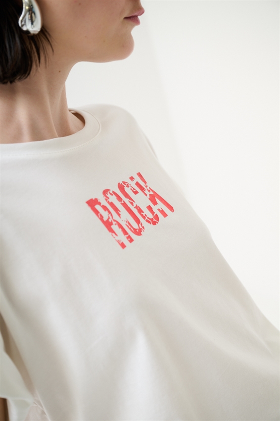 T-SHIRT CON STAMPA ROCK LAMINATA