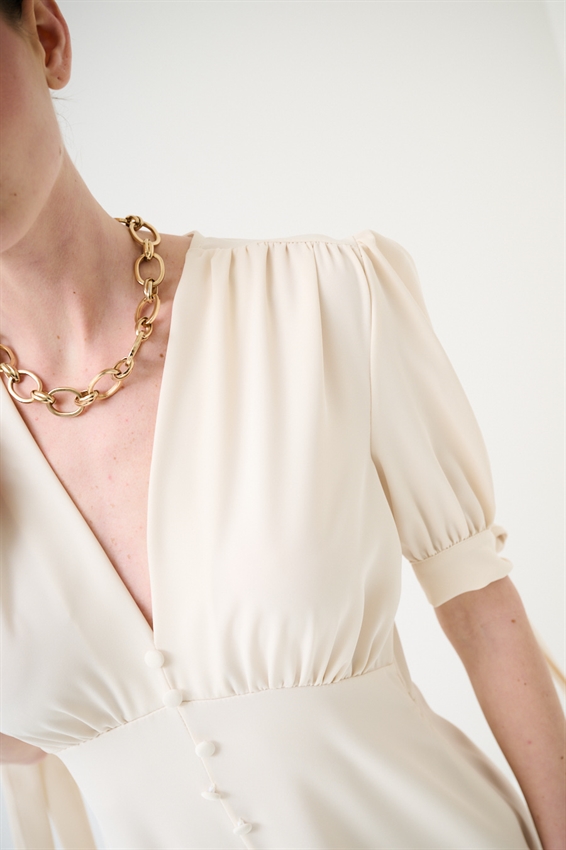 ABITO CORTO CON BOTTONI FODERATI BURRO