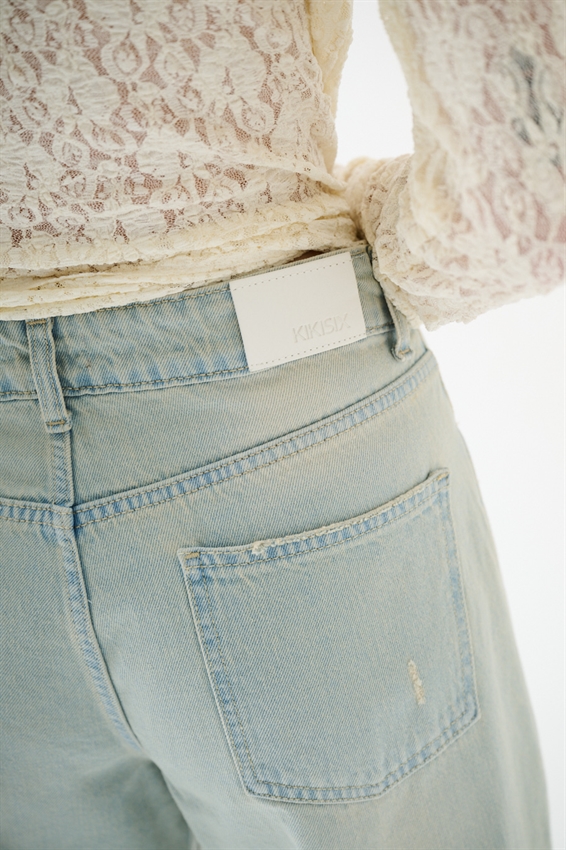 JEANS BAGGY CON ROTTURE EFFETTO SABBIATO BLU CHIARO