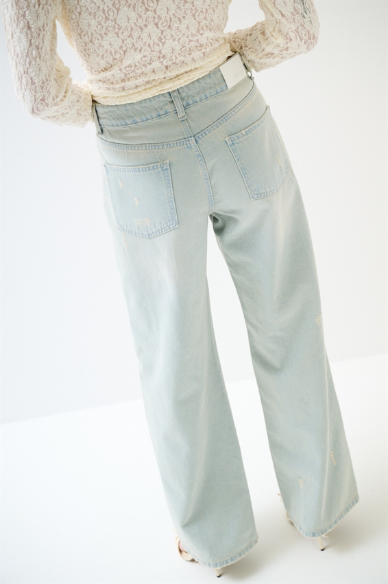 JEANS BAGGY CON ROTTURE EFFETTO SABBIATO BLU CHIARO