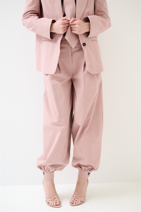 PANTALONE IN COTONE CON RIPRESA SUL FONDO ROSA