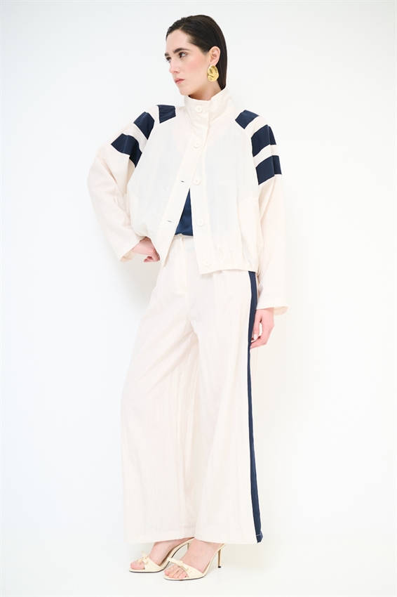 PANTALONE CON BANDA A CONTRASTO BURRO/BLU