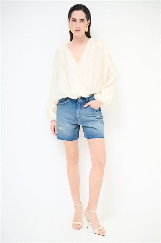 SHORTS IN DENIM A TAGLIO VIVO