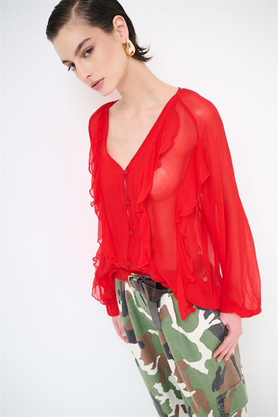 BLUSA CON BOTTONI E VOLANT