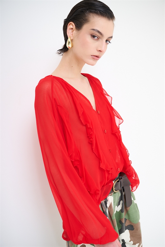 BLUSA CON BOTTONI E VOLANT