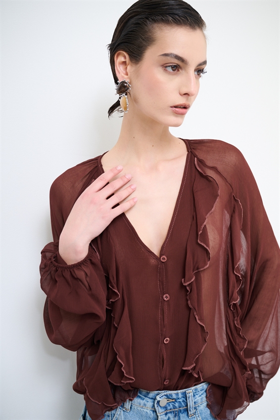 BLUSA CON BOTTONI E VOLANT