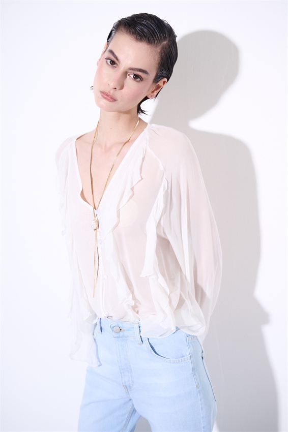 BLUSA CON BOTTONI E VOLANT