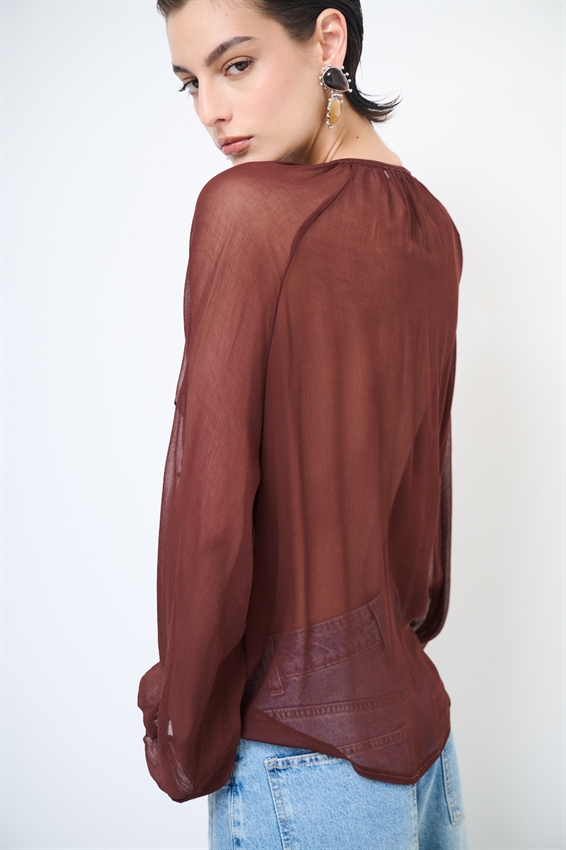 BLUSA CON BOTTONI E VOLANT MORO