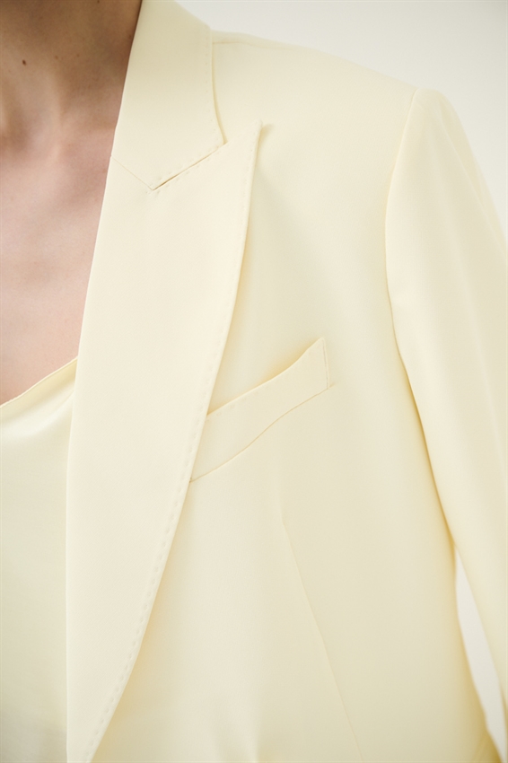 BLAZER MONOPETTO CON REVERS CLASSICI E UN BOTTONE GIALLO