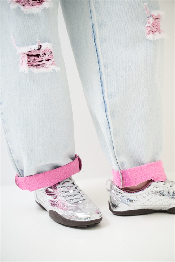 JEANS MARMORIZZATO CON STRAPPI E INTERNO FLUO