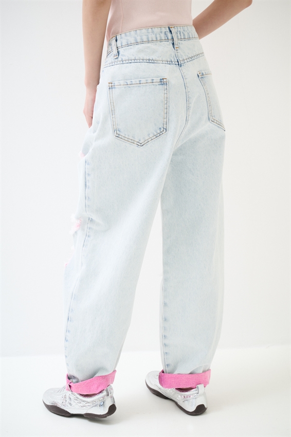 JEANS MARMORIZZATO CON STRAPPI E INTERNO FLUO