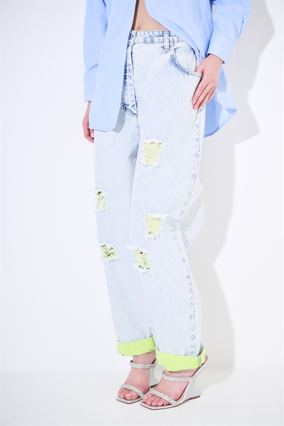 JEANS MARMORIZZATO CON STRAPPI E INTERNO FLUO