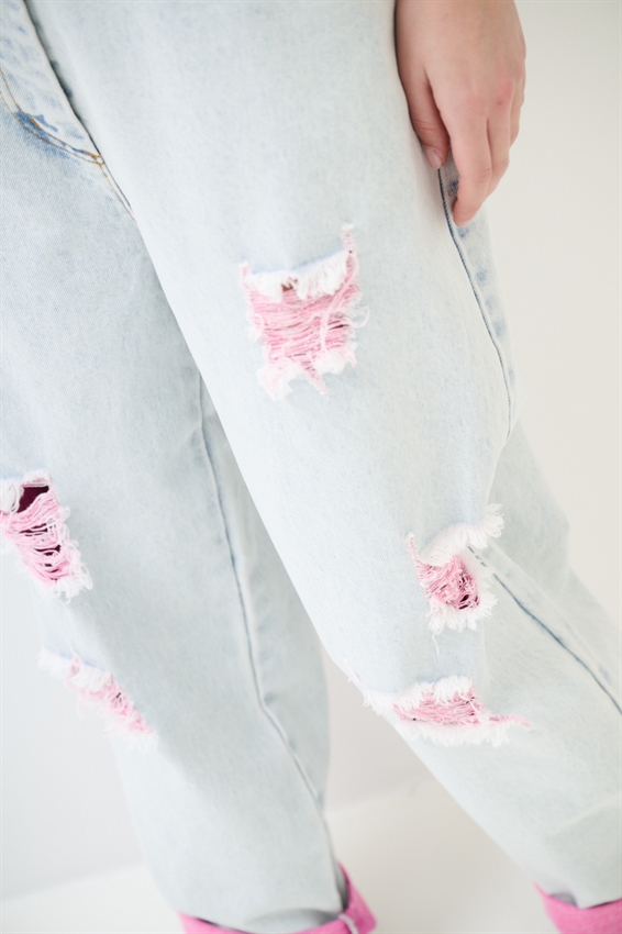 JEANS MARMORIZZATO CON STRAPPI E INTERNO FLUO