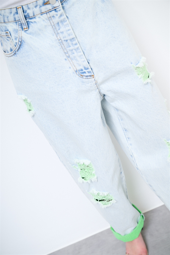 JEANS MARMORIZZATO CON STRAPPI E INTERNO FLUO VERDE
