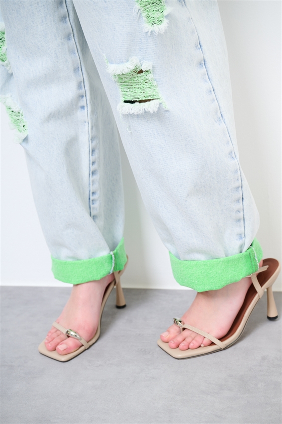 JEANS MARMORIZZATO CON STRAPPI E INTERNO FLUO VERDE
