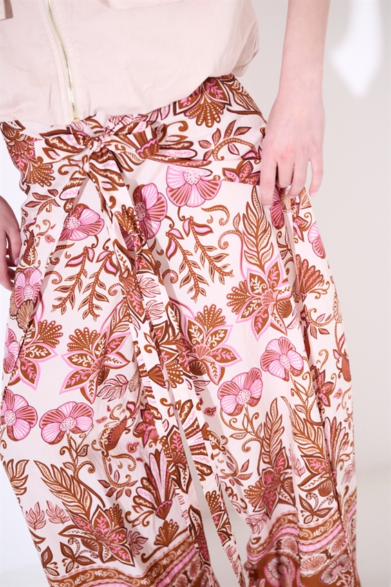 PANTALONE PAREO CON FIOCCO STAMPATO ROSA