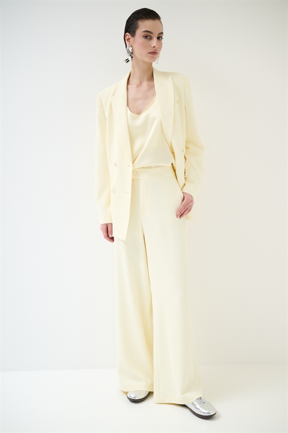 PANTALONE A GAMBA LARGA CON VITA CLASSICA GIALLO