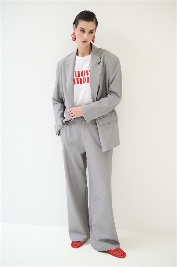 PANTALONE A GAMBA LARGA CON VITA ELASTICIZZATA SUL RETRO