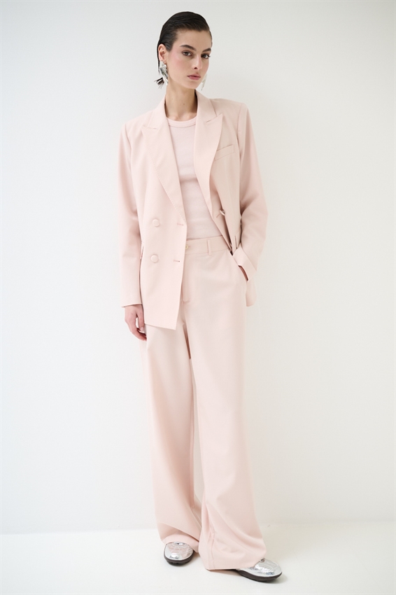 PANTALONE A GAMBA LARGA CON VITA ELASTICIZZATA SUL RETRO ROSA