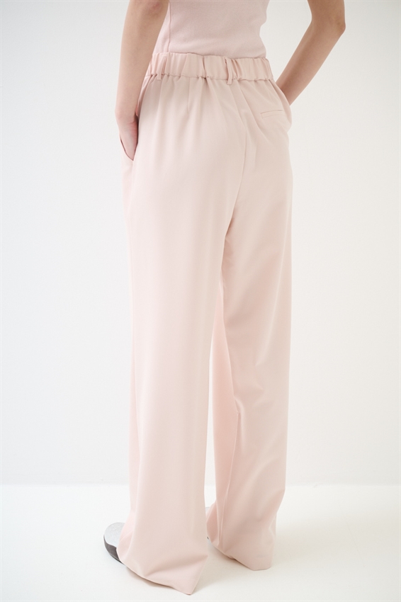 PANTALONE A GAMBA LARGA CON VITA ELASTICIZZATA SUL RETRO ROSA