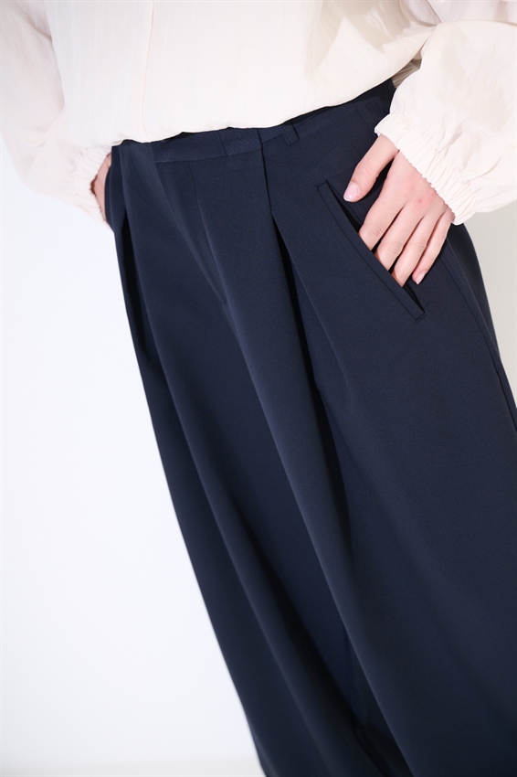 PANTALONE A GAMBA LARGA BOTTONI E TASCHE OBLIQUE BLU