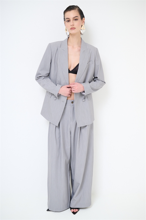 PANTALONE A GAMBA LARGA BOTTONI E TASCHE OBLIQUE GRIGIO