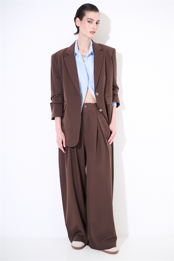 PANTALONE A GAMBA LARGA BOTTONI E TASCHE OBLIQUE MORO