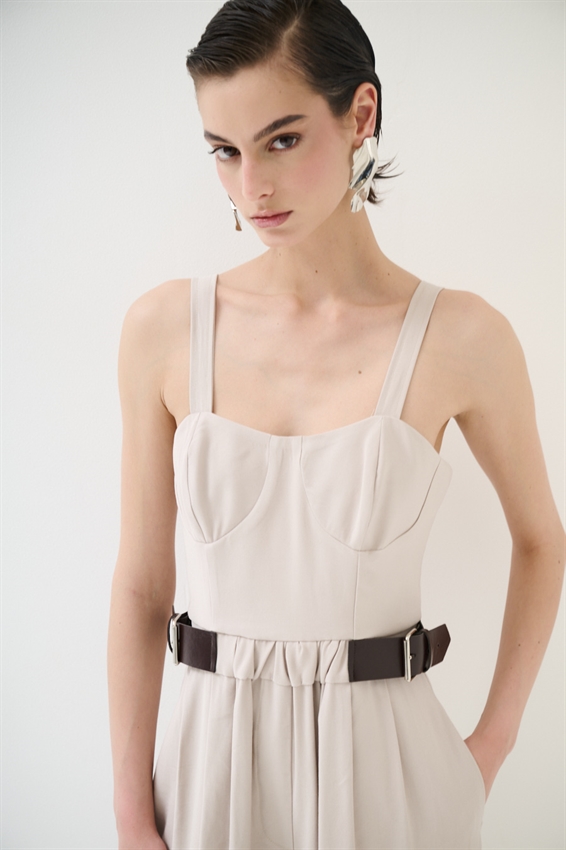 TUTA A PALAZZO CON FIBBIE BEIGE