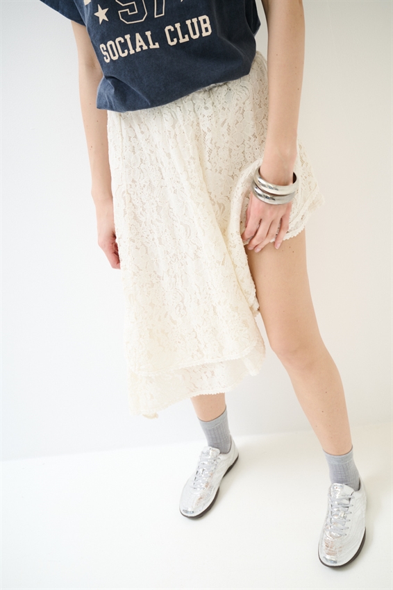 GONNA ASIMMETRICA IN PIZZO CON DOPPIA BALZA BURRO