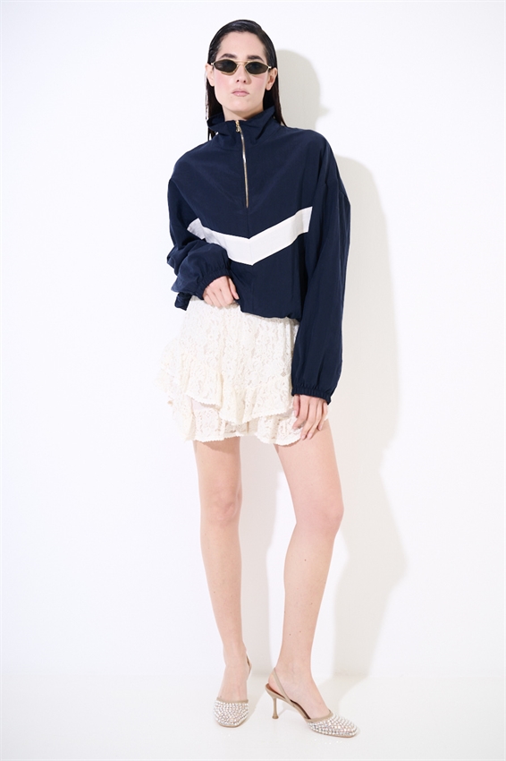 MINIGONNA IN PIZZO CON DOPPIA BALZA