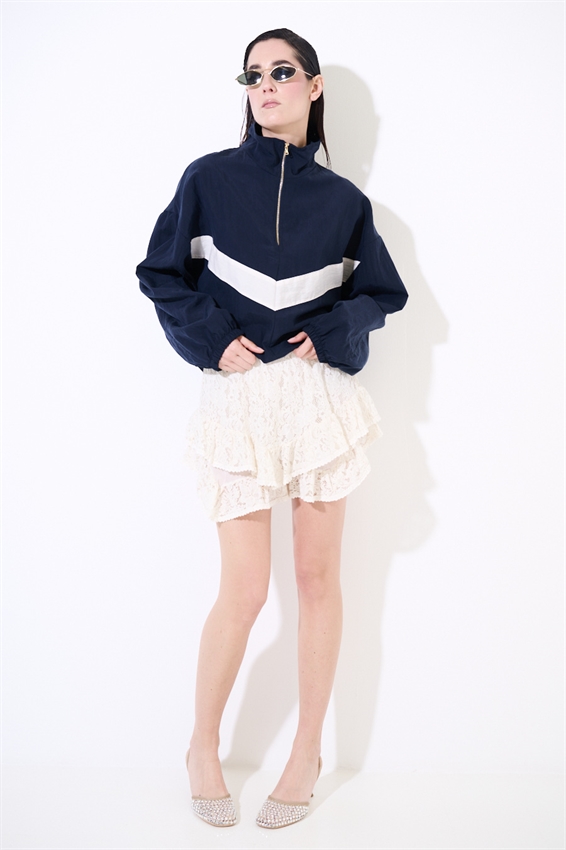 MINIGONNA IN PIZZO CON DOPPIA BALZA