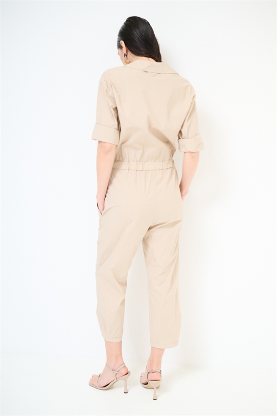 TUTA INTERA CON TASCHE IN TELA