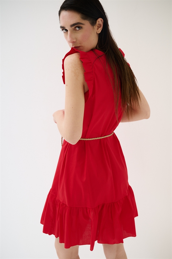 ABITO CORTO CON BALZA SUL FONDO ROSSO