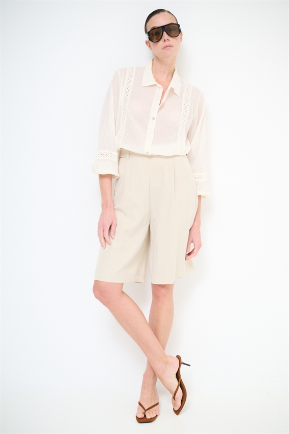 CAMICIA CON INSERTI PASSAMANERIA