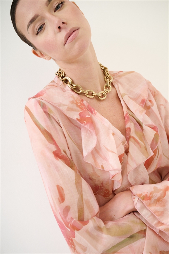 BLUSA CON VOLANT A FANTASIA