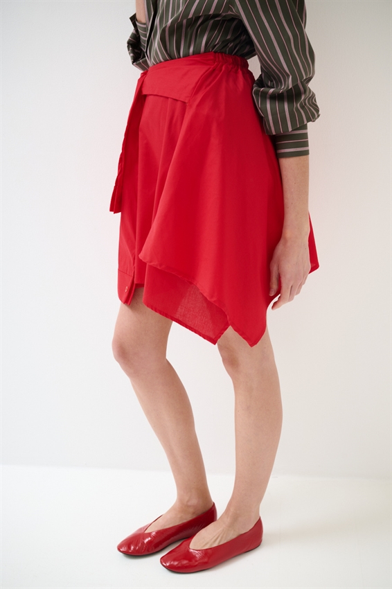 MINIGONNA A PUNTE CON MANICHE IN VITA