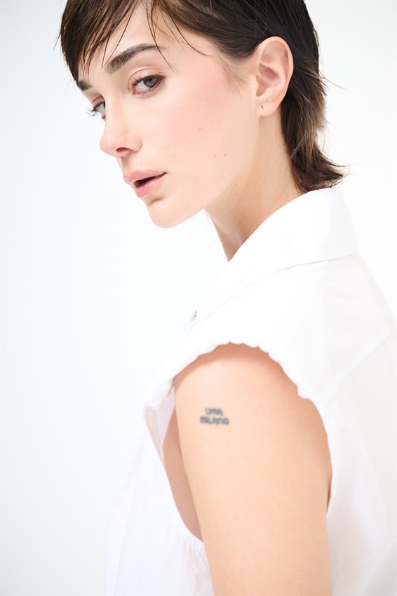 CAMICIA SMANICATA CON SPALLINI