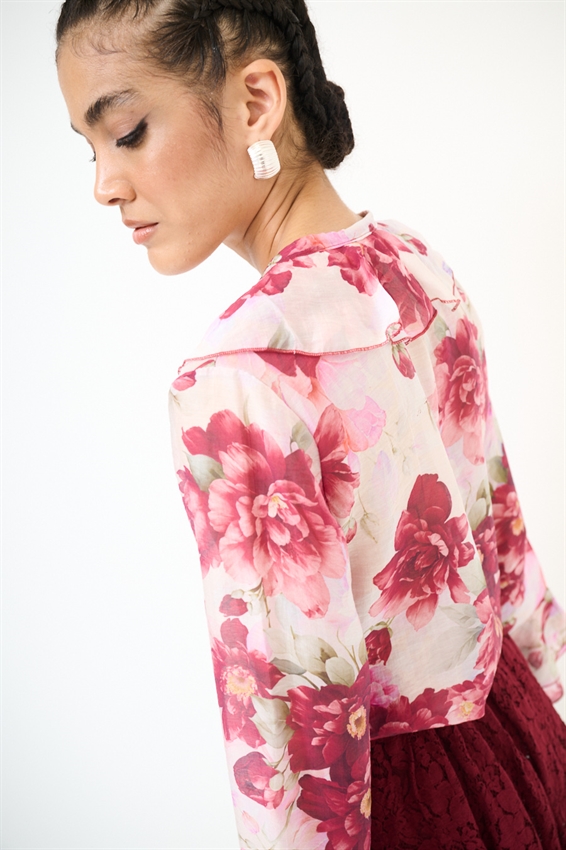 BLUSA CON VOLANT A FANTASIA