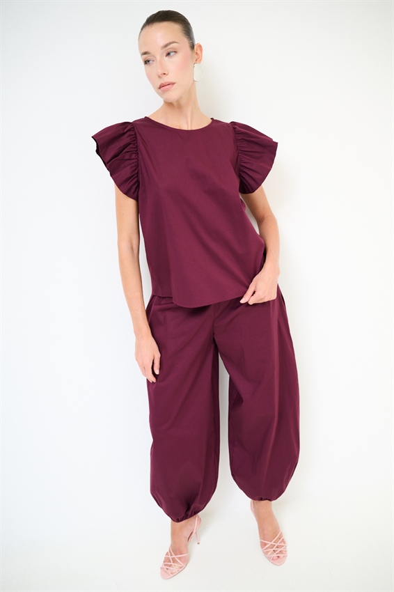 TOP SMANICATO CON DOPPIA GALA