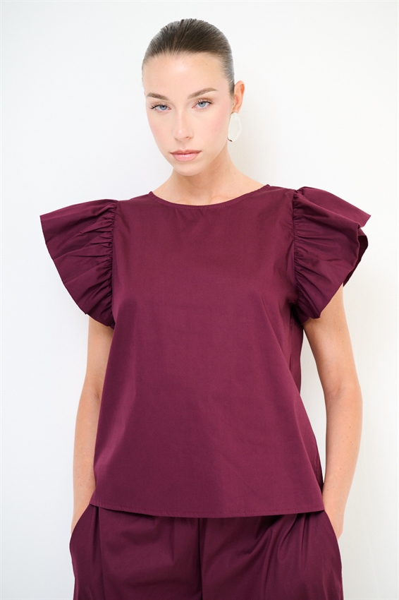 TOP SMANICATO CON DOPPIA GALA