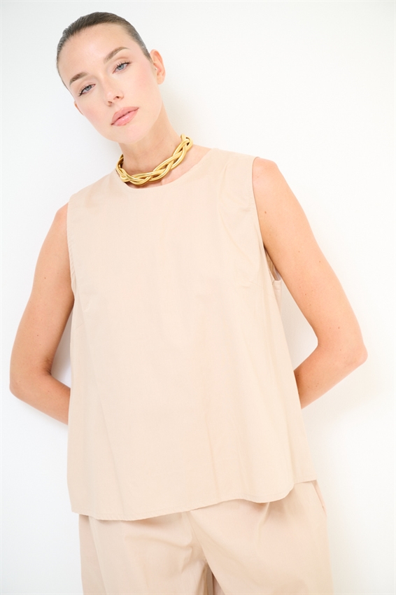 TOP SMANICATO CON BOTTONI DIETRO